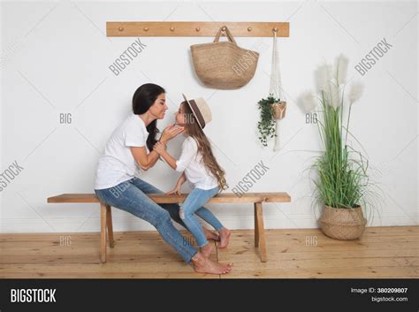 Mother Puts On Her Image And Photo Free Trial Bigstock