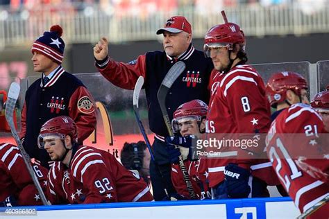 Head Coach Barry Trotz Of The Washington Capitals Looks On Next To