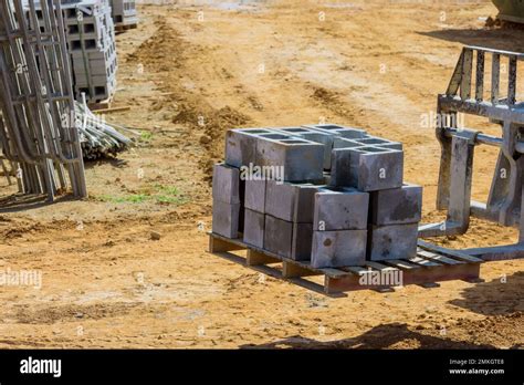 Using Boom Truck Forklift Cement Blocks Are Moved To Location Where