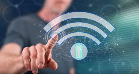 Hombre Que Toca Un Concepto De La Seguridad Del Wifi Imagen De Archivo