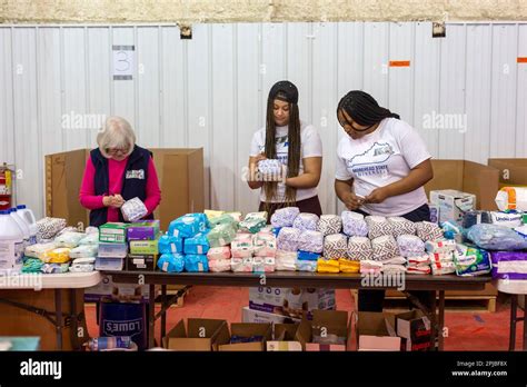 Mayfield, Kentucky, Volunteers sort donated food, clothing, and other ...