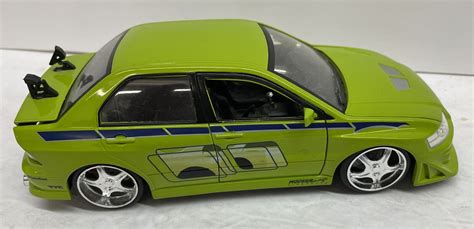 Jada Fast And Furious Brians Mitsubishi Lancer Evolution Vii Diecast Model Car Ebay