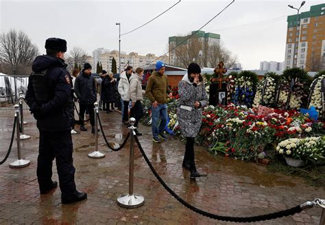 Navalnys Mother Brings Flowers To His Grave Day After Moscow Funeral