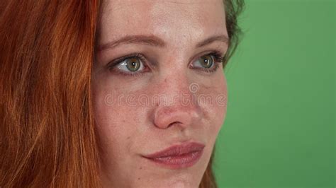 Young Beautiful Ginger Haired Woman Looking To The Camera Stock Video