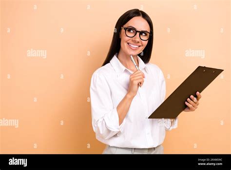 Photo Of Dreamy Thoughtful Woman Dressed White Shirt Eyewear Writing