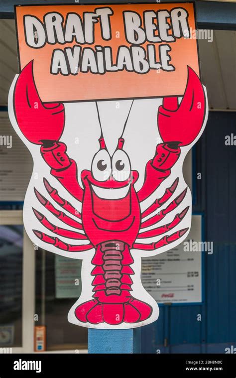 USA, Maine, Eastport, lobster motif on seafood restaurant Stock Photo ...