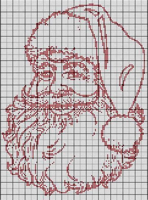 A Cross Stitch Pattern With A Santa Clause Wearing Glasses And Holding