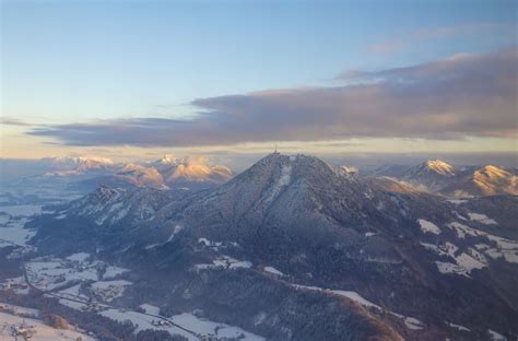 An aerial view of snow covered mountains and a valley · Free Stock Photo