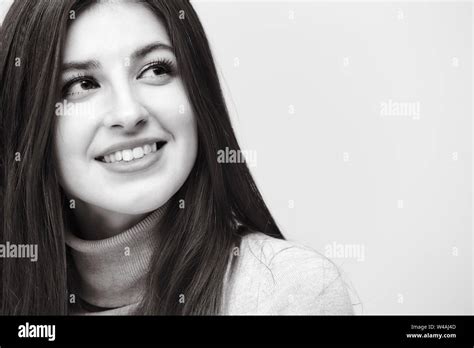 Black And White Portrait Of A Beautiful Caucasian Woman Looking Up