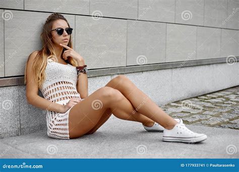 Outdoor Fashion Portrait Of Stylish Young Woman In Sunglasses And