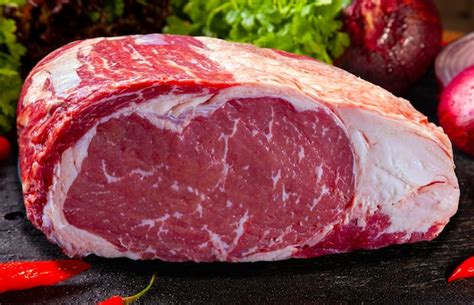 Premium Photo Red Raw Steak Sirloin Against