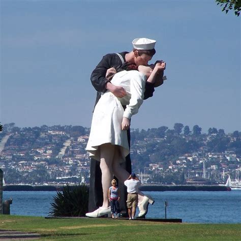 The Kiss Statue Next To The Uss Midway In San Diego Vacation Locations San Diego Couple Photos