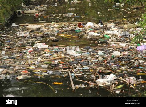 Plastic Waste in a river in Indonesia, near Ponorogo Stock Photo - Alamy