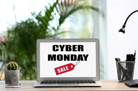 Premium Photo Modern Laptop With Text Cyber Monday Sale On Screen In Room
