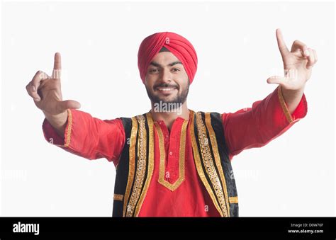 Man Doing Bhangra The Folk Dance Of Punjab In India Stock Photo Alamy