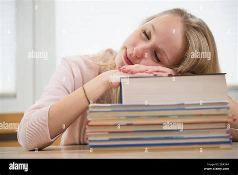 Teenage Girl Sleeping On Books Stock Photo Alamy