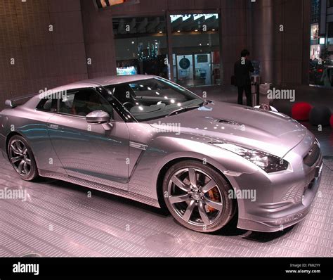 A new Nissan on display at a showroom in Ginza district, Tokyo, Japan ...