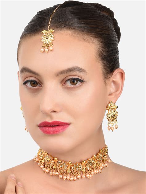 Buy Zaveri Pearls Gold Toned Kundan Pearl Studded Jewellery Set