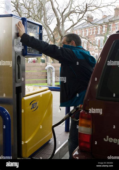 Man Filling Up A Car With Lpg Fuel Stock Photo Alamy