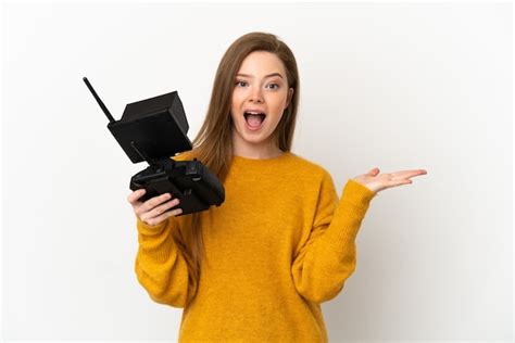 Chica Adolescente Sosteniendo Un Control Remoto De Drone Sobre Fondo