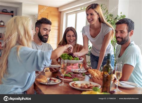 Group Friends Eating Lunch Together Having Great Time Home Stock Photo ...