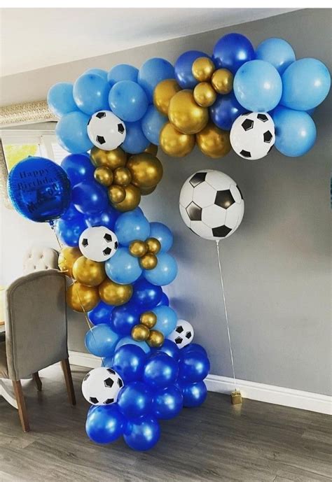 A Bunch Of Balloons That Are In The Shape Of A Number One With Soccer