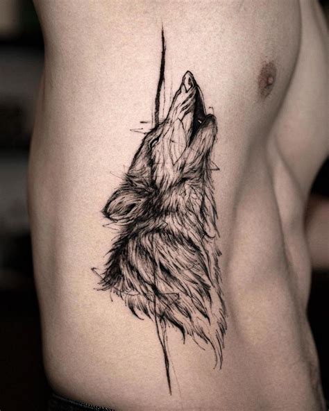 20 tatuajes de lobos pequeños en el brazo tribales