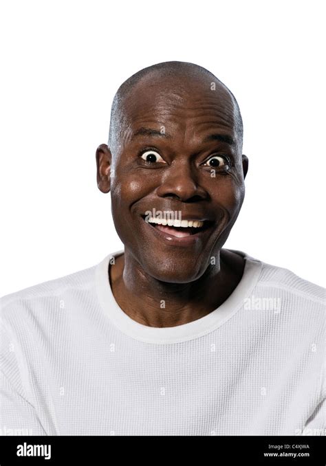 Portrait Of A Mature Expressive Man With Eyes Open Wide In Studio On
