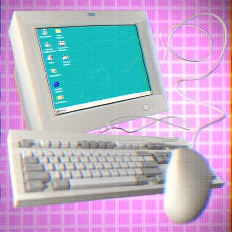 A Computer Monitor And Keyboard Sitting On Top Of A Pink Tableclothed