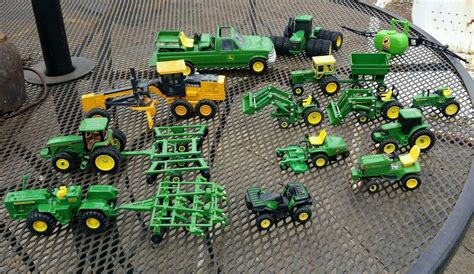 ERTL 1:64 scale John Deere farm tractor assortment with implements 17 pc lot | #1802508860