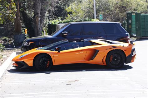 Kylie Jenner Stepping Out of Her Orange Lamborghini Aventador Roadster ...