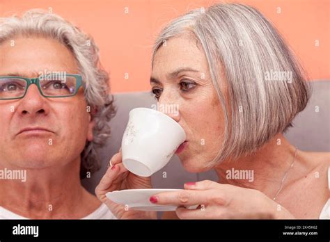 Pretty Mature Couple Having Fun In The Bed While Eating Breakfast Stock Photo Alamy