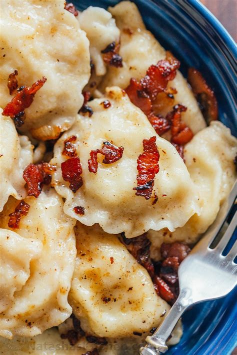 Pierogi Filled With Cheesy Potatoes And Served With Crisp Bacon Melted