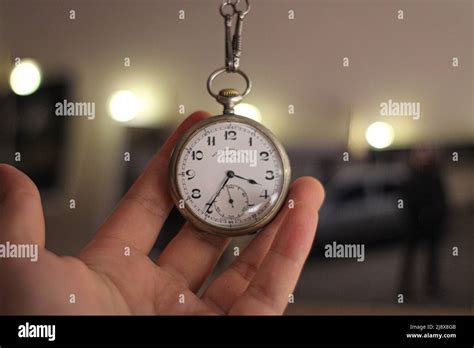 Hand Held Vintage Pocket Watch Stock Photo Alamy