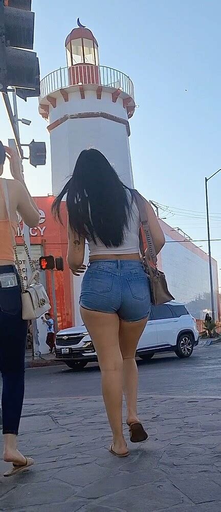 OC VIDEO Super Sexy Denim Short Shorts On This Brunette With Tremendous Legs And Big Butt