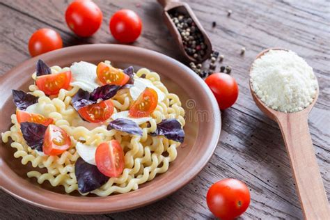 Fusilli Lunghi Bucati With Bolognese Sauce On A White Plate Isolated On