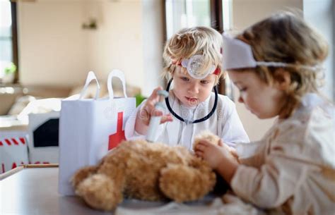 Children Brother Sister Playing Doctor Stock Photos Free And Royalty