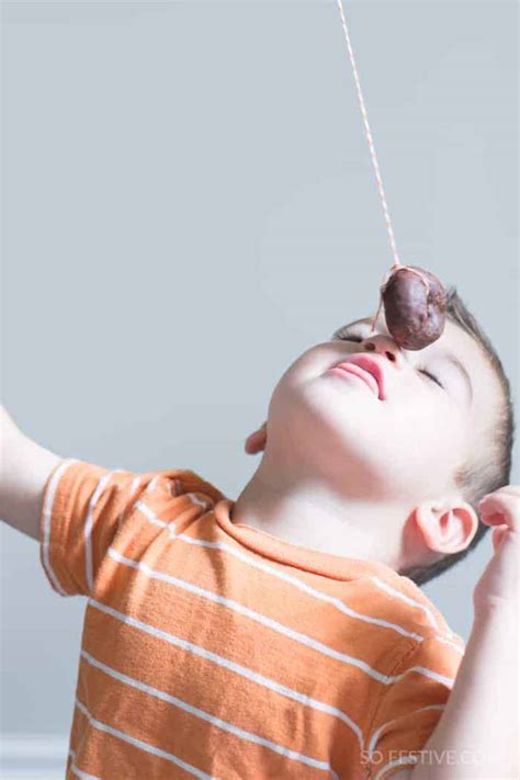 Donuts On A String Game Halloween Party Ideas So Festive