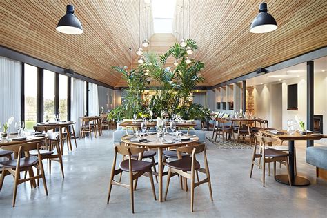 Softroom Converts Thatched Roof Pub Into Contemporary Restaurant And