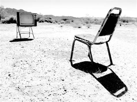 Premium Photo Empty Chair On Sand At Beach Against Sky