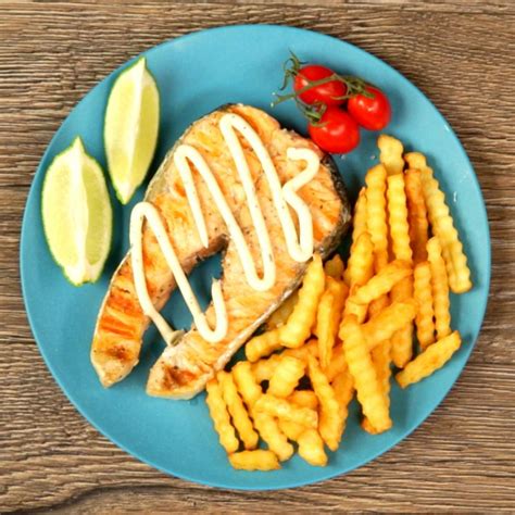 Grilled Salmon With French Fries So Delicious