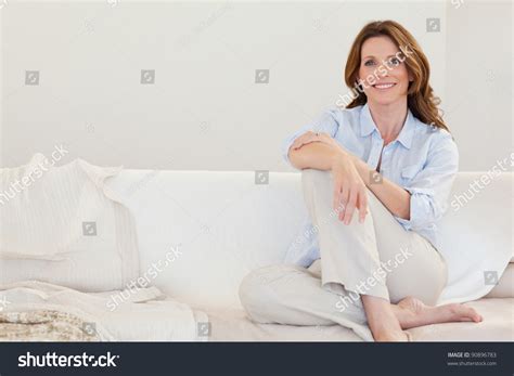 Smiling Mature Woman Sitting On Her Stock Photo Shutterstock
