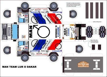 An Image Of A Paper Model Of A Truck With The Name Man Team Up O Dakar