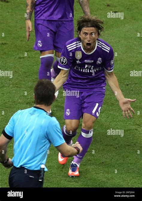 Real Madrid S Luka Modric Reacts To The Referee Felix Brych During The