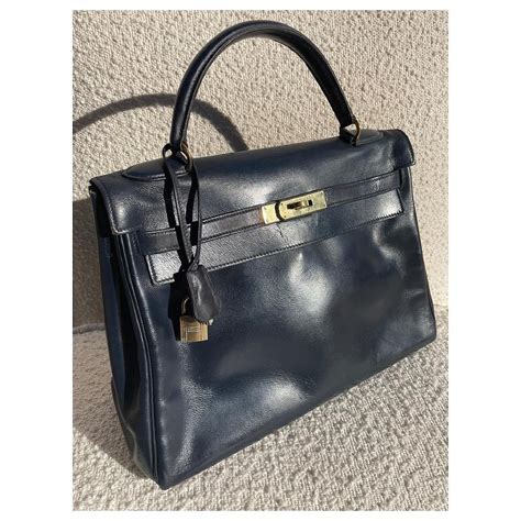 Sac Hermès Kelly bleu marine en cuir de box 32 cm ref 716157 Joli Closet