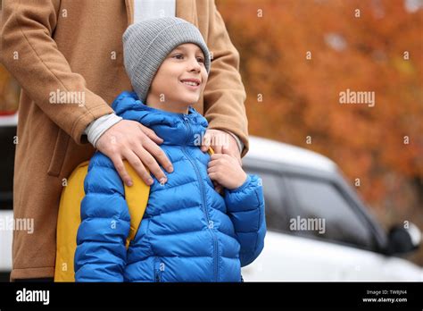 Father Hugging His Son Before School Stock Photo Alamy