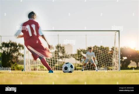 Soccer Goal Post And Ball Soccer Player Running And Kicking To Score