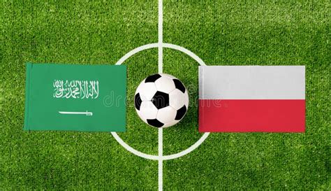 Top View Soccer Ball With Saudi Arabia Vs Poland Flags Match On Green