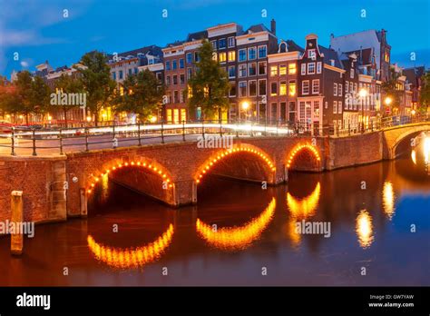 Night City View Of Amsterdam Canal And Bridge Stock Photo Alamy