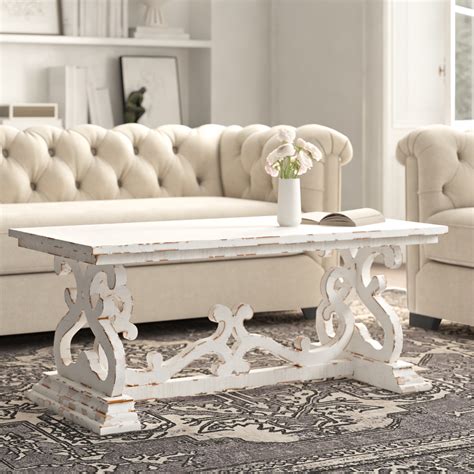 Kelly Clarkson Home Emersyn 46 Solid Wood Distressed Scrollwork Coffee Table And Reviews Wayfair